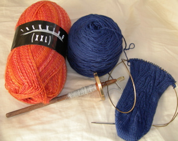 Yarn, spindle, and sock.