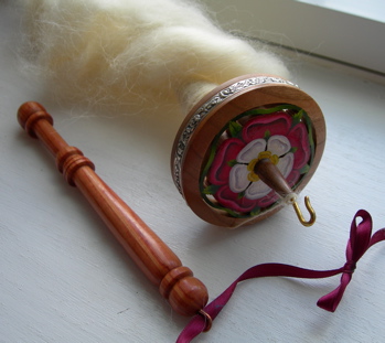 Spindle and distaff.