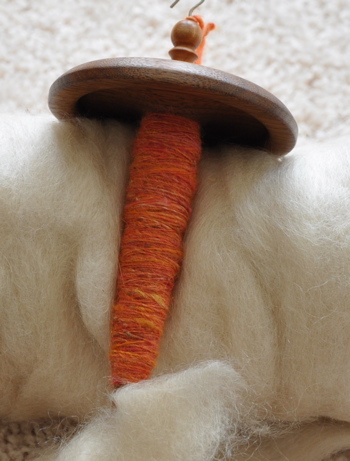 Spindle and suri fibre.