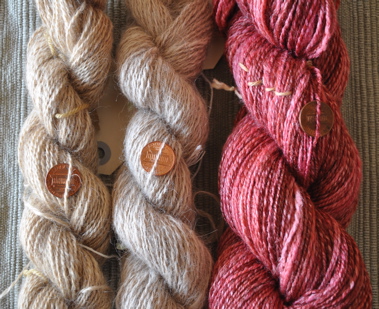 Three skeins of yarn.