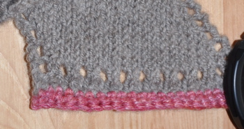 Scarf with crochet trim.